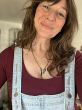 Load image into Gallery viewer, Anita Fontaine wearing flower charm necklace from the Spring Break Collection of Little Paper Crane