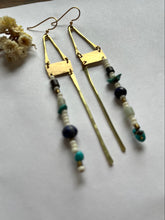 Load image into Gallery viewer, Long Beaded Earrings hanging from brass hammered triangles and shapes. Raw brass.
