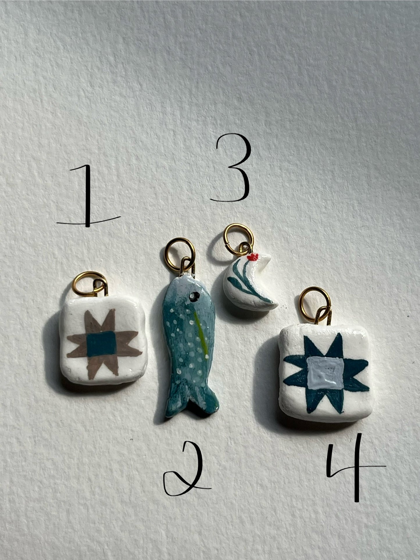 Blue fish, barn quilt, moon hand painted clay charms