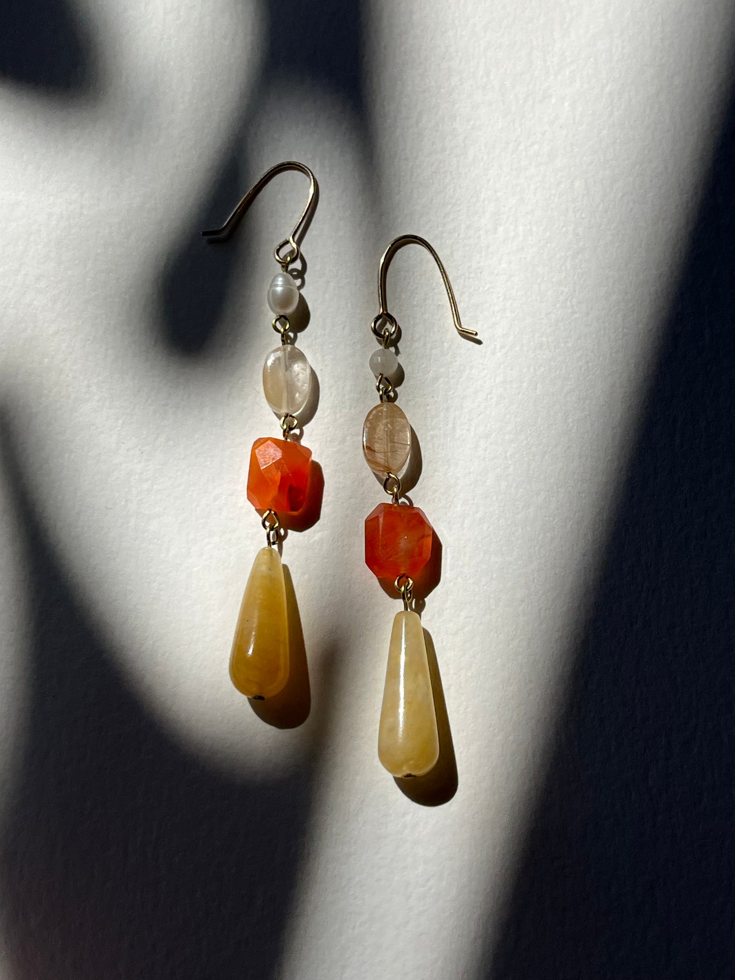 Gathered Treasure Dangle Earrings in orange