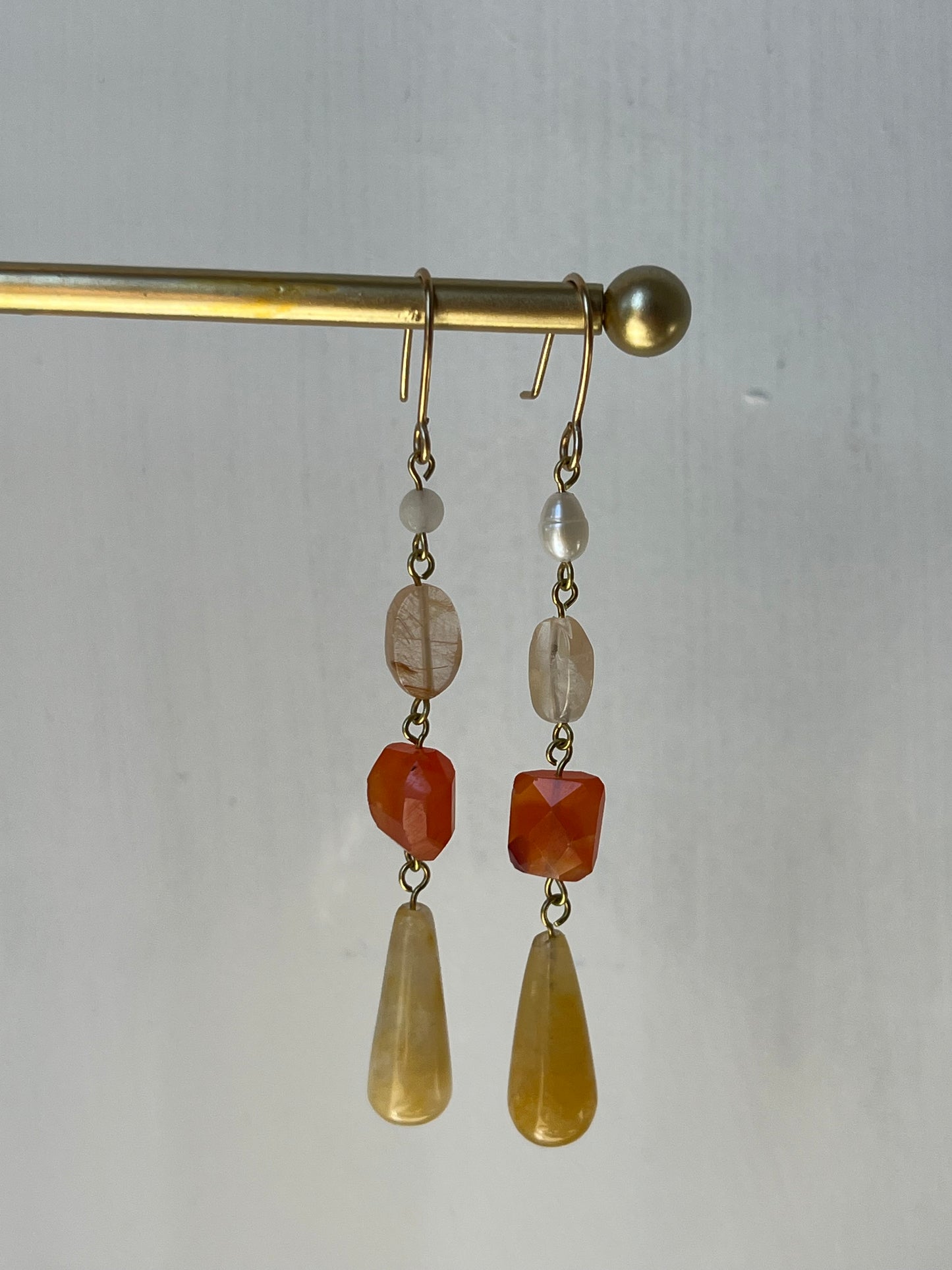 Gathered Treasure Dangle Earrings in orange