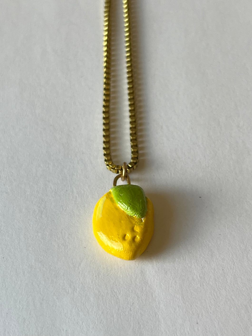 Lemon hand-painted clay pendant necklace
