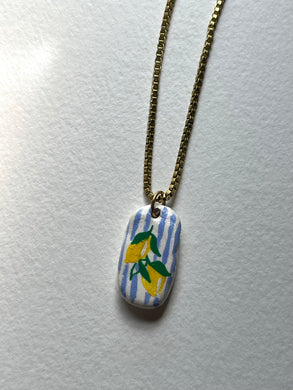 Lemon hand-painted Dolce Vita clay pendant necklace