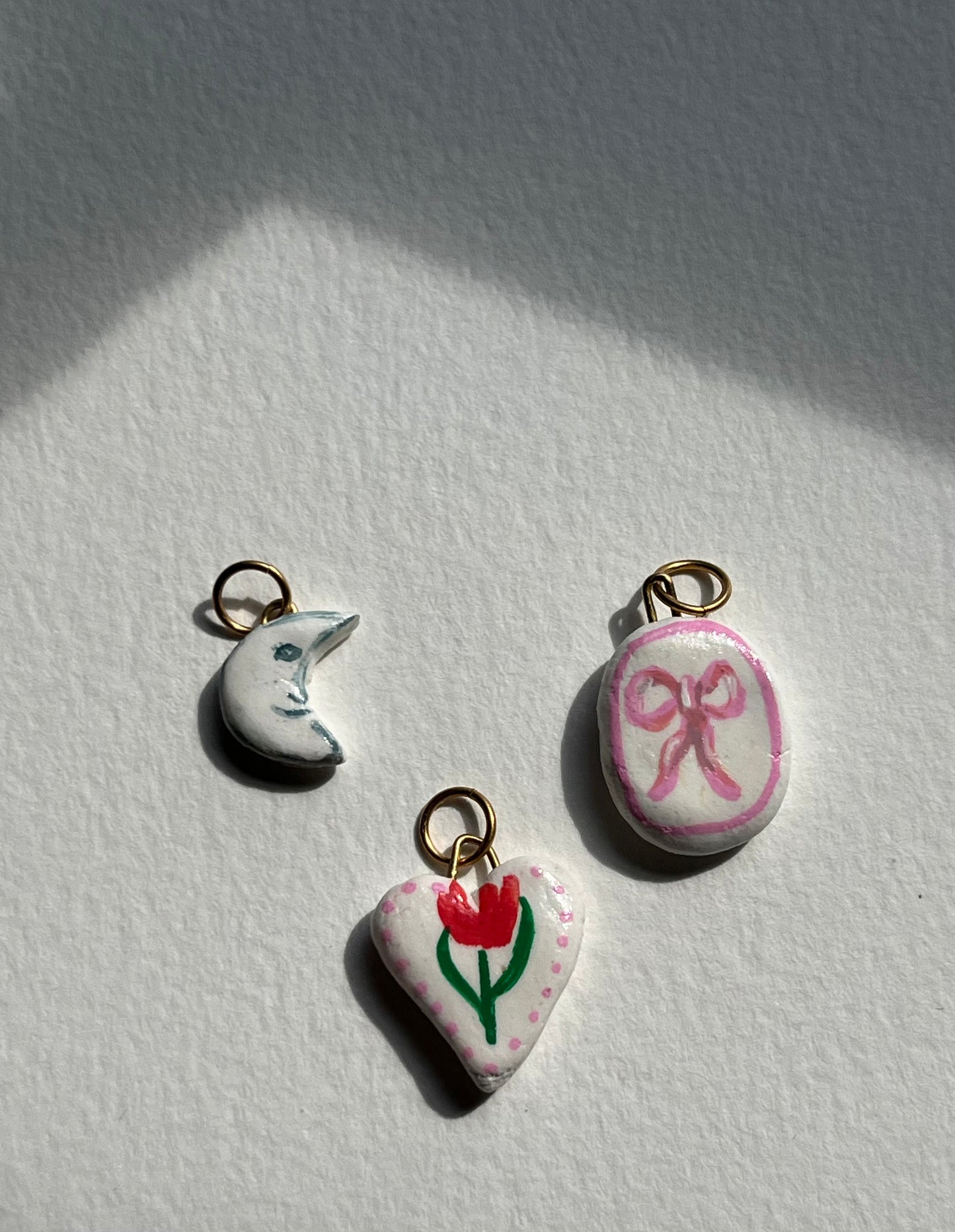 Man in the Moon charm, Pink Bow charm, Heart Charm