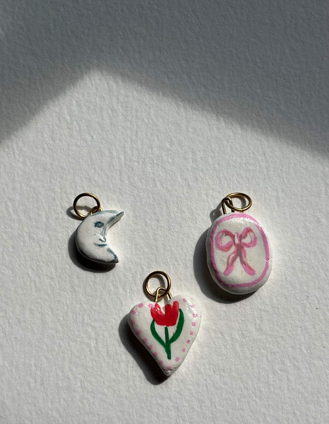 Man in the Moon charm, Pink Bow charm, Heart Charm