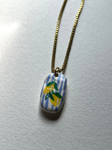 Lemon hand-painted Dolce Vita clay pendant necklace