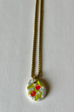 Load image into Gallery viewer, Oranges on blue gingham hand-painted clay pendant necklace