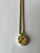 Load image into Gallery viewer, Oranges on blue gingham hand-painted clay pendant necklace